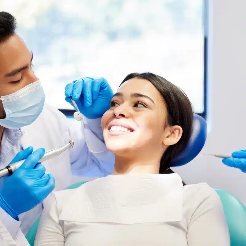 Dentist examining Dental Fillings in La Mesa